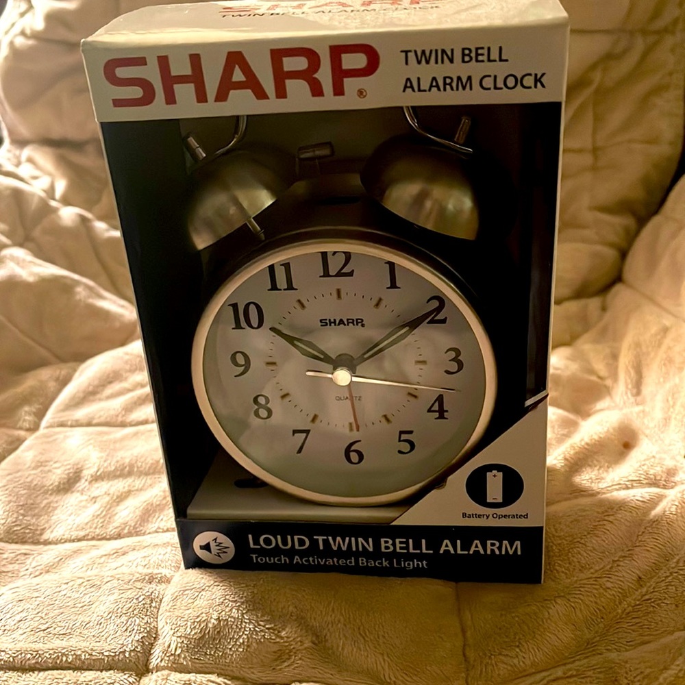 Sharp Twin bell alarm clock. Loud twin bell alarm touch activated clock.